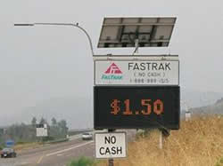 Picture showing "FastTrak" toll of $1.50, and indicating a "no cash" (i.e., all electronic) collection method.