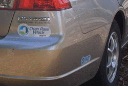Picture of car with "Clean Pass Vehicle" sticker on the bumper.