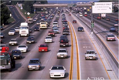 figure 1 - photo - Photograph of an High Occupancy Vehicle lane on I-405 in Orange County, CA