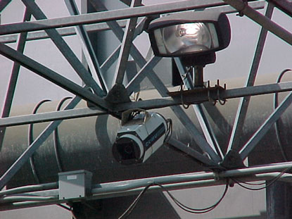 photo of enforcement camera mounted on overhead gantry
