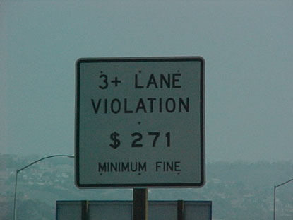 State of California HOV violation sign indicating a minimum fine of $271.00