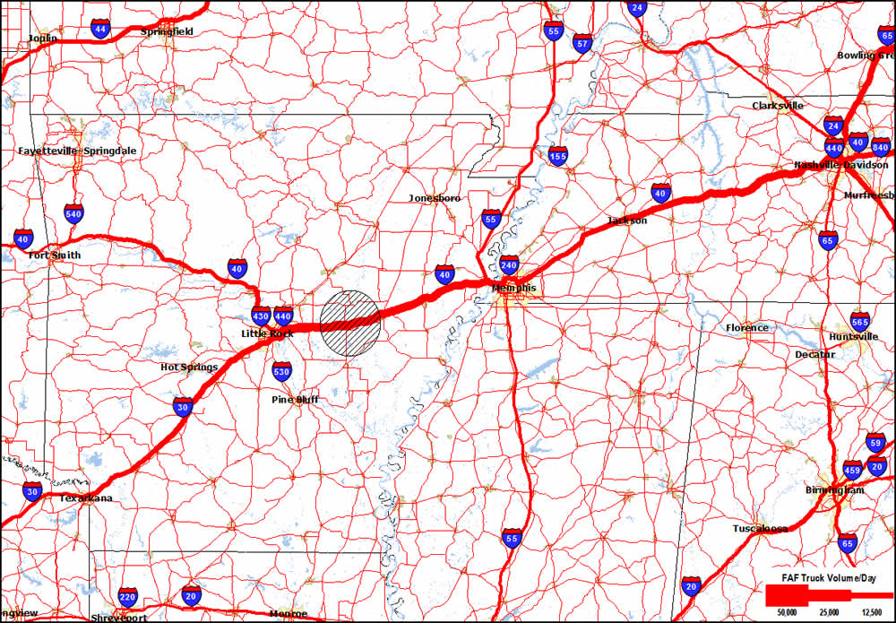 A regional map of Arkansas and western Tennessee showing major concentration of truck volumes on I-40. A shaded circle between Little Rock, AR and Memphis, TN identifies the segment of I-40 affected by flooding.