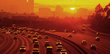 Vehicles on Interstate Highway at Sunset