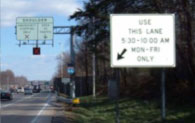 Figure 41: Photo: Signage allowing use of highway shoulder, reserving right-most turning lane for morning commute period only.