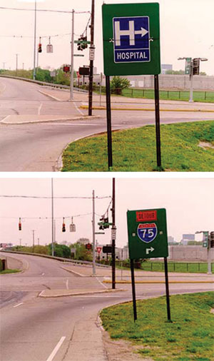 Two photographs, one above the other, show a fold-out sign in both of its configurations. The sign is on the right side of a two-lane, one-way road meeting another road at a traffic light 20 feet beyond the sign. The sign is rectangular with a green background, and is hinged horizontally in the middle to allow a folding section to cover either the top or the bottom half. The top configuration is painted with a blue rectangular sign with white lettering. The sign has a large capital “H” and an arrow pointing to the right, and below that is the word “Hospital.” In the bottom configuration, a rectangular orange sign with black lettering reading “Detour” is painted over a red, white, and blue interstate shield reading “75.” Beneath that, a white arrow makes a 90 degree turn to point to the right.