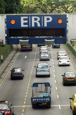 Photo. Traffic passing under an electronic road pricing (ERP) gantry in Singapore.