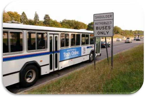 Figure 19. Photo. Mn/DOT BOS Regulatory Sign (Photo Courtesy of Mn/DOT). Photo of regulatory signs indicating that the shoulder is only open to authorized buses only. The sign reads "SHOULDER — AUTHORIZED BUSES ONLY".