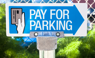 Photo of a pay-for-parking sign.