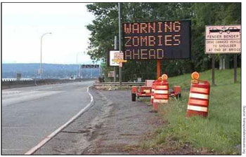 Figure 16. PCMS in several states have been illegally accessed and had messages changed. Source: Associated Press photo. A photo shows an electronic road sign with inappropriate text that indicates the portable changeable message sign has been hacked. Source: Source: transportationissues.org