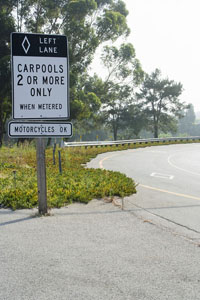 a carpool road sign
