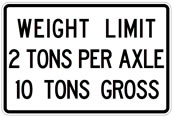 A white road sign with black letters that reads WEIGHT LIMIT 2 TONS PER AXLE 10 TONS GROSS