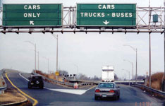 signs separating types of vehicle traffic