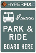 Hyperfix road sign that reads, Park and Ride, Board Here.