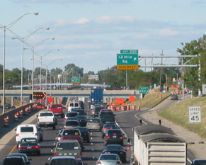 Image shows heavy traffic heading into an interstate work zone lane closure.