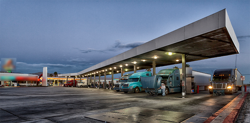 trucks refueling at a truck stop