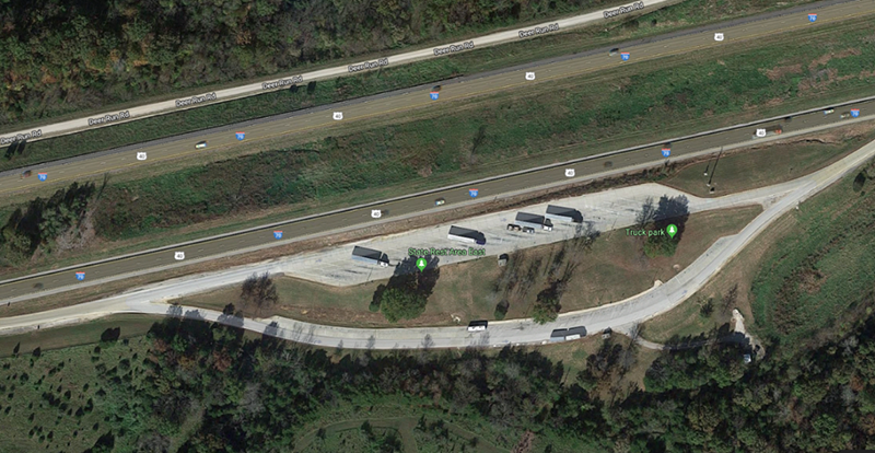aerial view of a highway rest area converted to truck parking