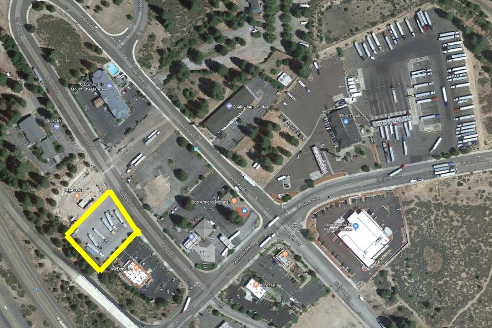 An aerial photo of the newly-created municipal truck parking area in Weed, CA, highlighted in yellow.