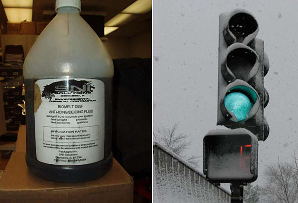 Figure 7. Chemical Deicer Fluid for Lens Application (D. Hansen). This figure has two photographs. To the left there is a photograph of a large bottle of chemical deicer fluid. The fluid in the bottle is dark brown/black, about 3/4 full, with a white cap and a white label on the front Biomelt D65F Anti-Icing/Deicing Fluid. On the right, there is a photograph of a snow-covered traffic light on a snowy day. The green light is lit and almost fully visible on the lens, even though the outer surfaces have snow on them. The walk-signal below has snow partially covering the display of how many seconds are available to cross.