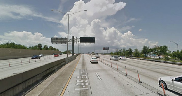 Figure 9 is a photo of I-95 express lanes in Miami Dade, Florida. The express lane is separated by the remaining traffic by flex posts.