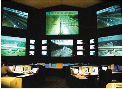 Monitors and large screens monitor the roadways via closed circuit camera inside the Maryland State Operations Center.
