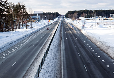Four-lane highway road in the wintertime.