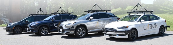 Shows four CARMA vehicles: sedans and SUVs. Each vehicle has CARMA written on the side and a contraption on top of the vehicle.