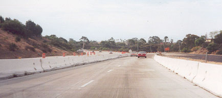 photo of a roadway narrowed with moveable barriers on each side