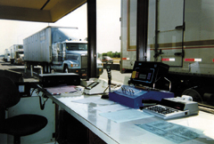 Photograph of a truck weigh station.