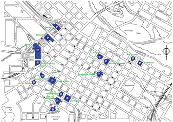 A street map of the central downtown grid shows parking facilities clustered near the convention center, near the exits off Route 394 at Third Avenue, and near the river front.