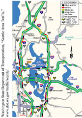 Figure 4-2. Location of SR 520 DMS. A map showing major highways in the Seattle area is enhanced to provide a snapshot in time of comparative levels of highway congestion as detected by monitors. Icons indicate the location of numerous VMS on and off sites, and color coding indicates congestion in terms of stop and go, heavy, moderate, wide open, no data, and no equipment.