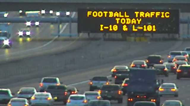 Figure 3. Interstate traffic with overhead sign that reads Football Traffic Today I-10 & L-101