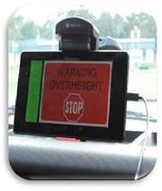 Screen shot of a dashboard device displaying a warning overweight message.