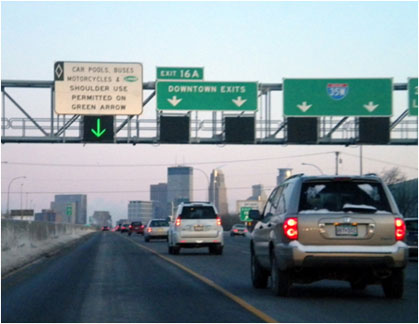 figure 25 - photo - Photograph of lane control signal over I-35W Priced Dynamic Shoulder Lane in Minneapolis, MN