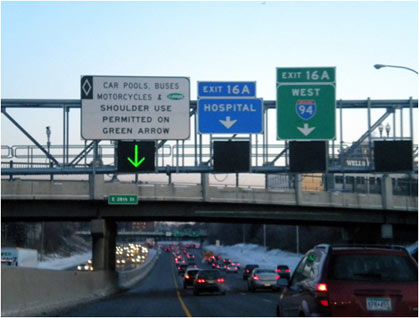 figure 58 - photo - Photograph showing overhead lane controls on priced dynamic shoulder lanes