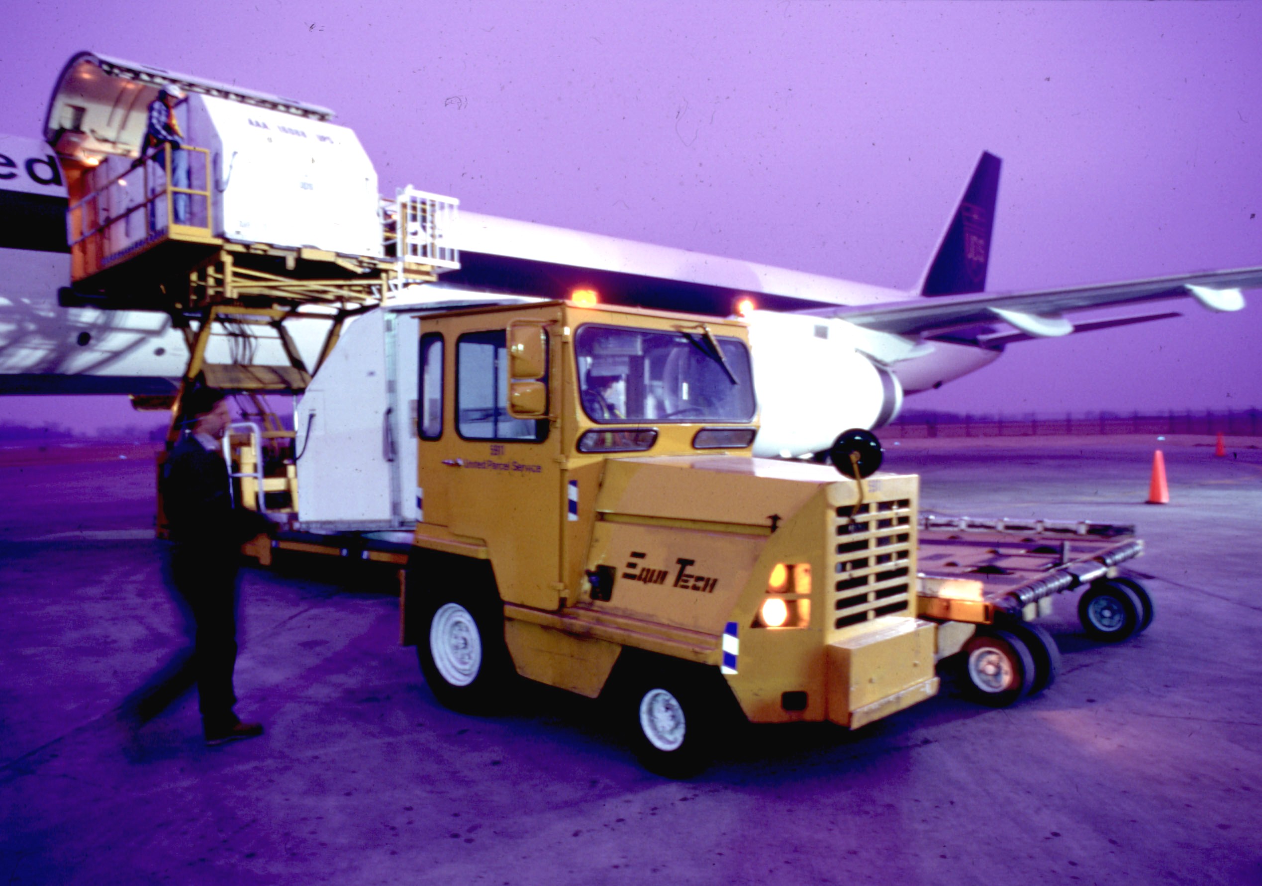 cargo being loaded onto an airplane