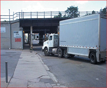 Image of a section of roadway called an intermodal connector.  This section is in poor condition