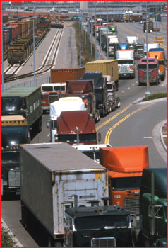 Image of trucks queuing up to enter a port terminal in sourthern California
