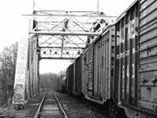 Picture of rail tracks and container train.