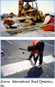 Two men installing cover to concrete vault for Bending Plate WIM system. In the background is excavation equipment used in making the opening in the road for the scale (top). Man bent over cover using rivet tool to secure plate cover (bottom). Source: International Road Dynamics, Inc.