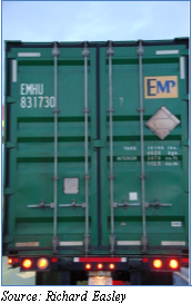 Screen shot photo of back of truck. Image uses container character recognition (CCR) technology that converts the image to text and numbers. Source: Richard Easley.