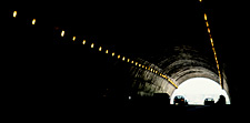 Image of vehicles going through a tunnel.