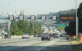 Figure 10: Photo: Highway showing signage for dynamic speed limits and queue warning.