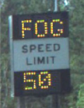 Figure 21: Photo: Dynamic speed limit signage showing reduced speed for fog conditions.