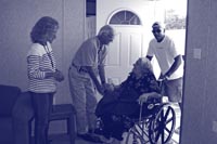 Photo. Private transportation assistance being given to the elderly and the disabled.