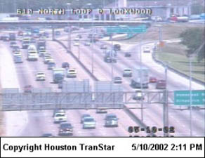 photo from a Houston TranStar traffic camera of heavy traffic on a divided highway