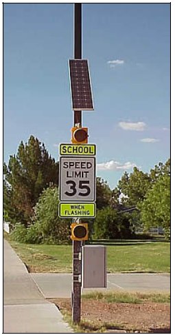 Sign indicating that a 35 mph speed limit is in effect when the lights above the sign are flashing.