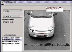Photo. Image taken by an Automatic License Plate Recognition (ALPR) camera showing the front of a car and its license plate.