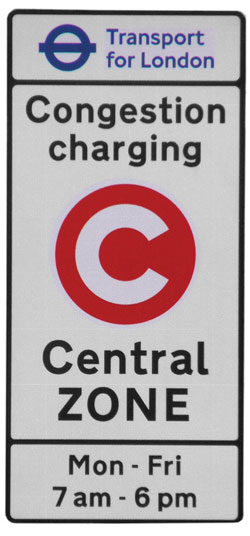 Photo. A Transport for London sign advises motorists that they are entering a congestion charging central zone, which operates from Monday to Friday, 7 am – 6 pm.