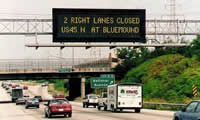 An image of an overhead Dynamic Message Sign on a highway.