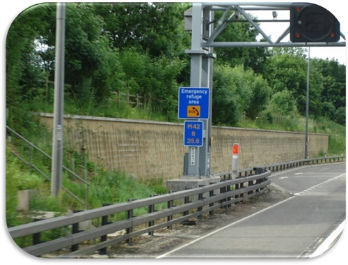 Figure 38. Photo. Emergency Call Box on Facility with Active Traffic Management. Photo illustrating an emergency call box at an emergency refuge area on a motorway in England